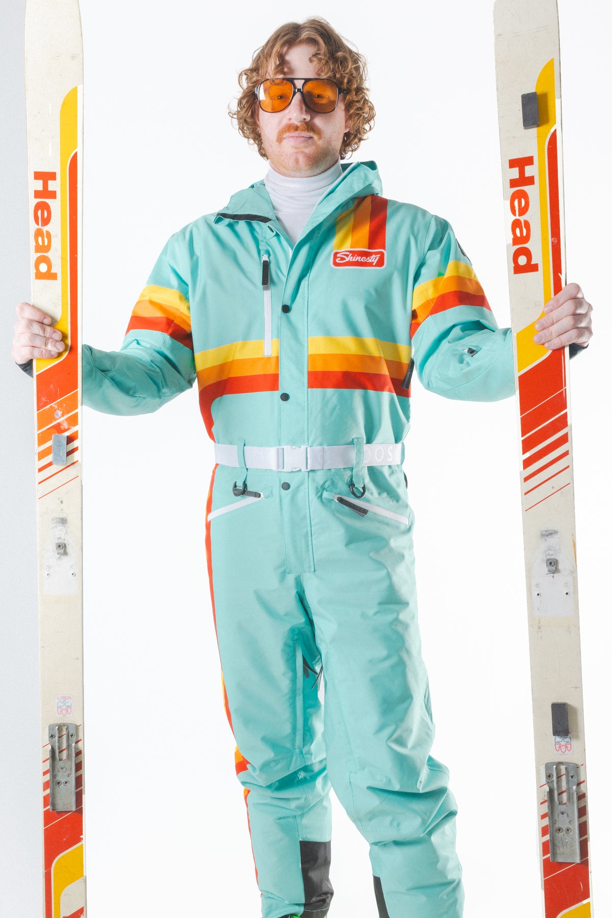 The Midday Aprés | Teal and Orange Retro Stripe One Piece Ski Suit - Shinesty
