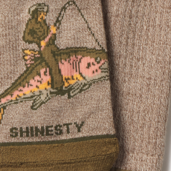 Heathered tan Shinesty crew sock knit with a fly-fishing trout scene and the brand name woven into the cuff
